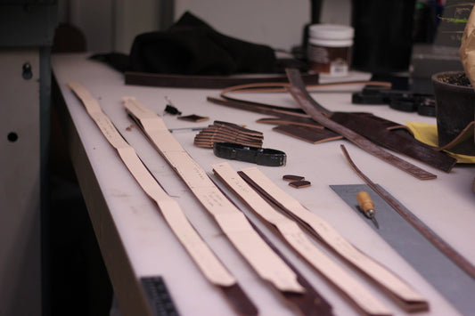 bridle leather components being prepared for one of the Ashley Clarke England holdall bags