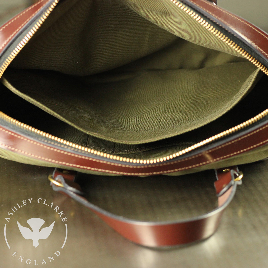 close up of the interior of the waxed canvas briefcase by Ashley Clarke England