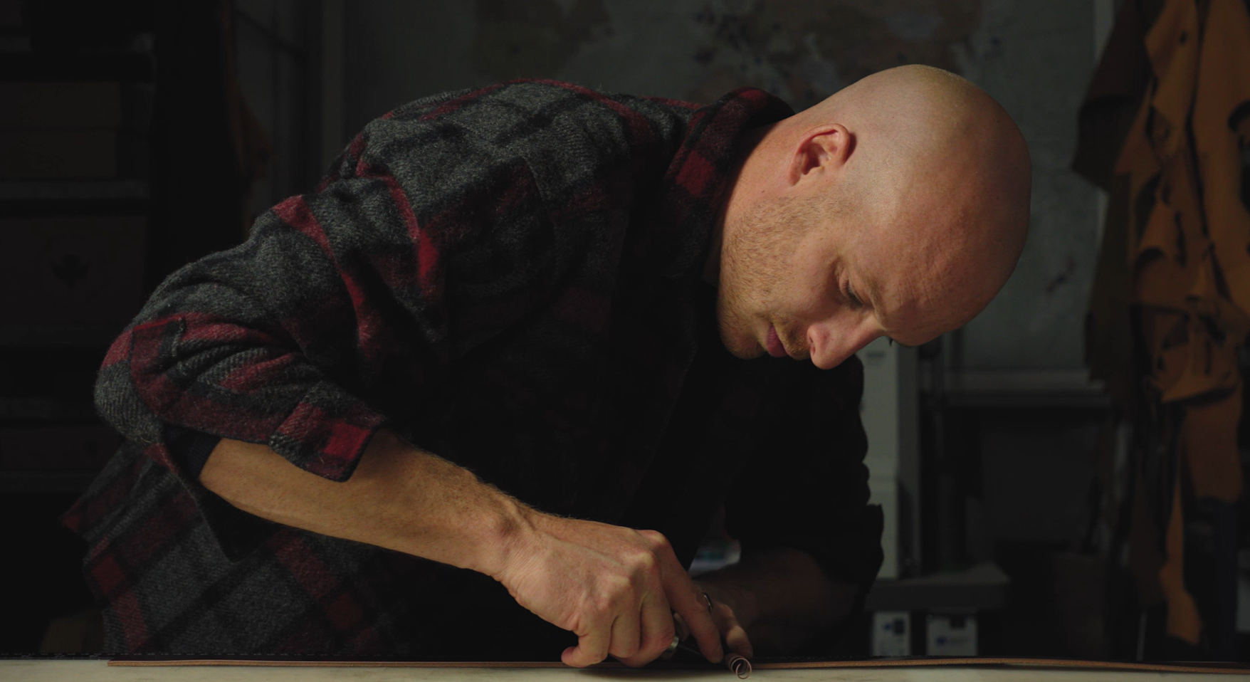 Load video: The making of a leather and waxed canvas briefcase.