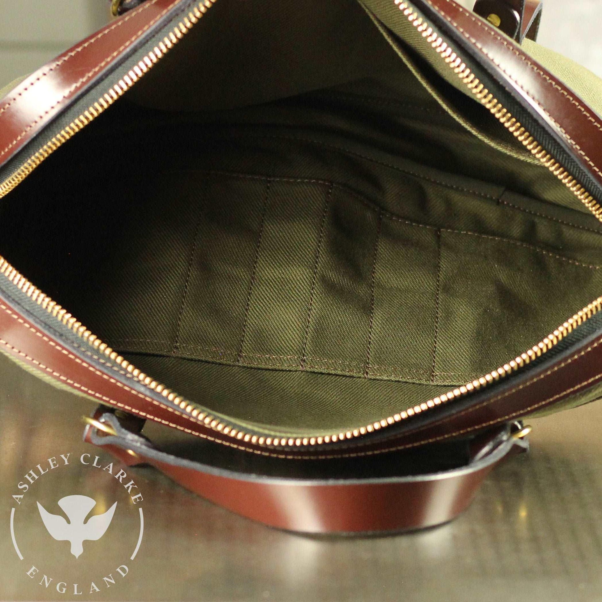 interior look of an Ashley Clarke England waxed canvas laptop bag with bridle leather accents