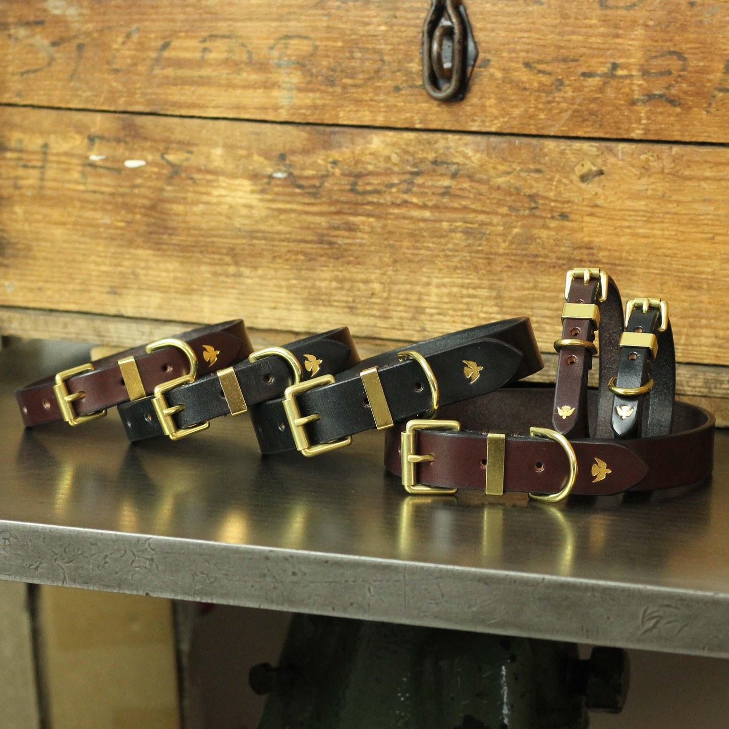 a set of bespoke leather belts with brass buckle by ashley clarke